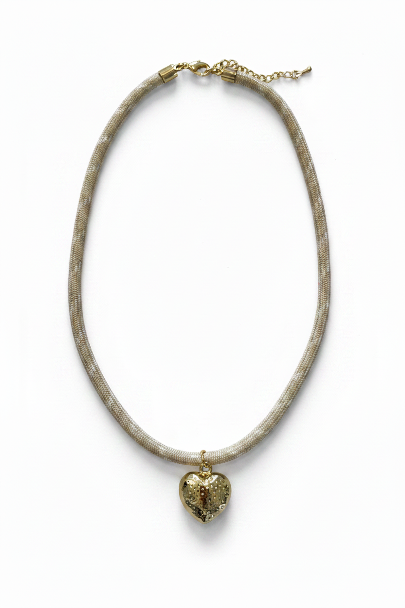Freedom Heart beige cord necklace on white background