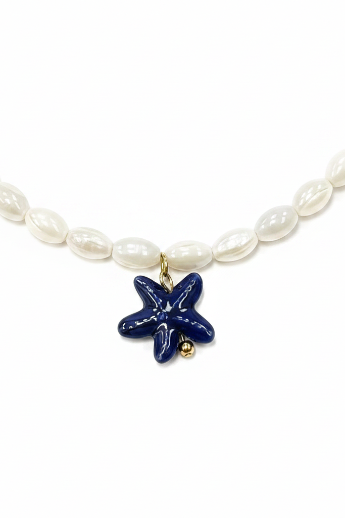 Closeup of navy blue starfish charm
